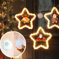A glowing white LED star-shaped pendant light hanging as a festive Christmas decoration.