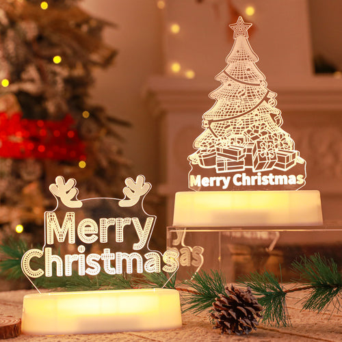 A small 3D acrylic LED night lamp on a base, glowing with a festive etched design suited for Christmas, New Year, or Valentine's Day.